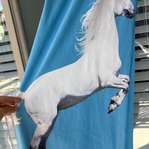 TYLER McGILLIVARY viral unicorn dress sold out online